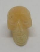 Small Hand Carved Yellow Aventurine Skull