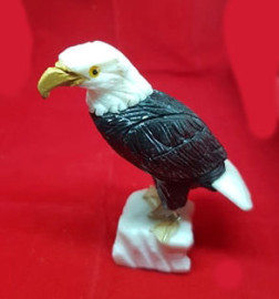 Hand Carved Black Eagle Standing on a Slab