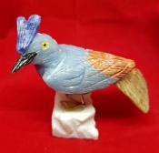 Hand Carved Blue Bird Standing on a Slab