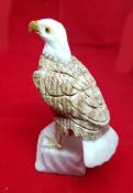 Hand Carved Brown Eagle Standing on a Slab