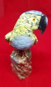 Hand Carved Green and Blue Parrot Standing on a Slab